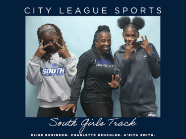 three students posing with peace signs